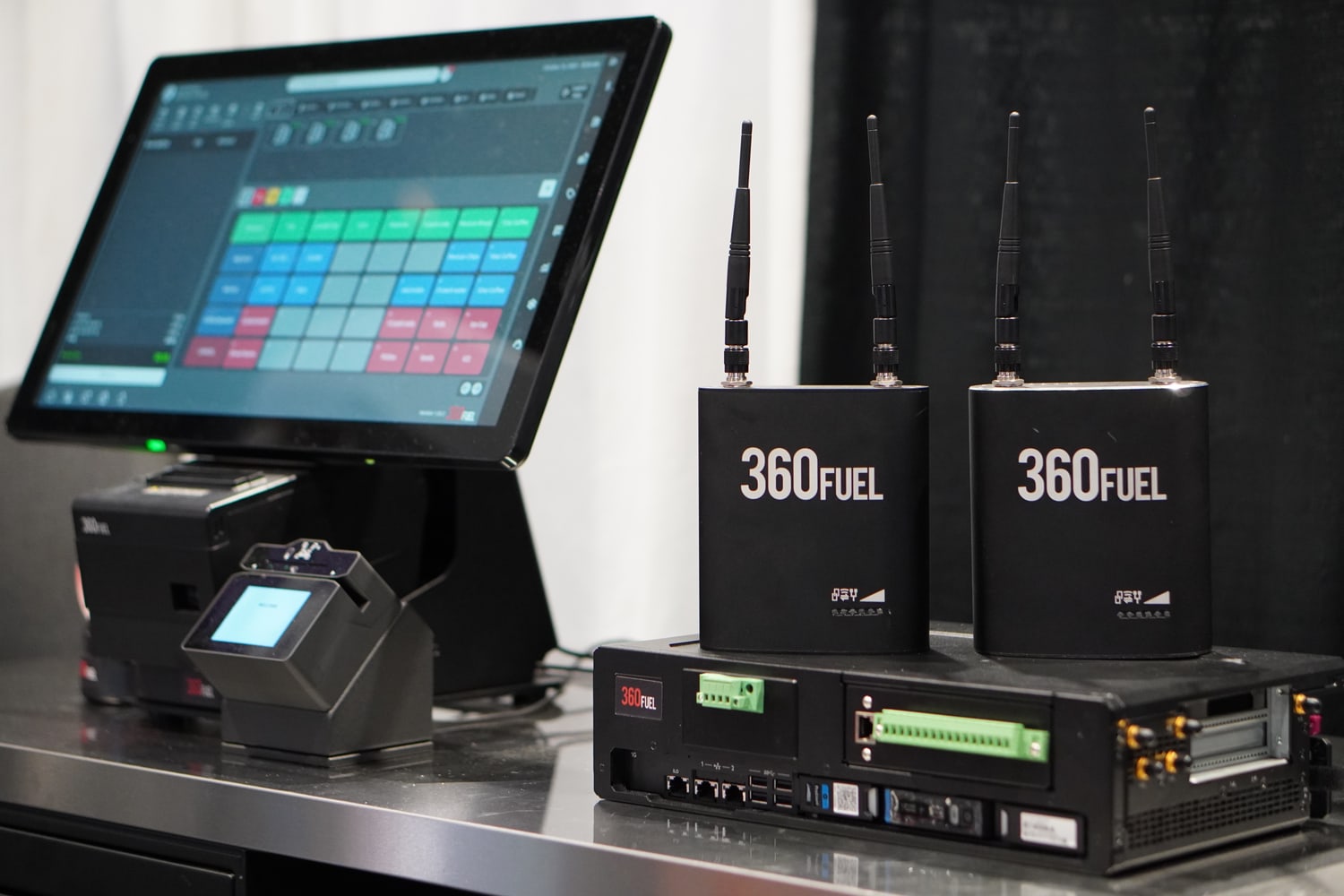 Original 360Fuel product photograph showing Retailer Console, Site Controller III, Wireless Ethernet and payment equipment